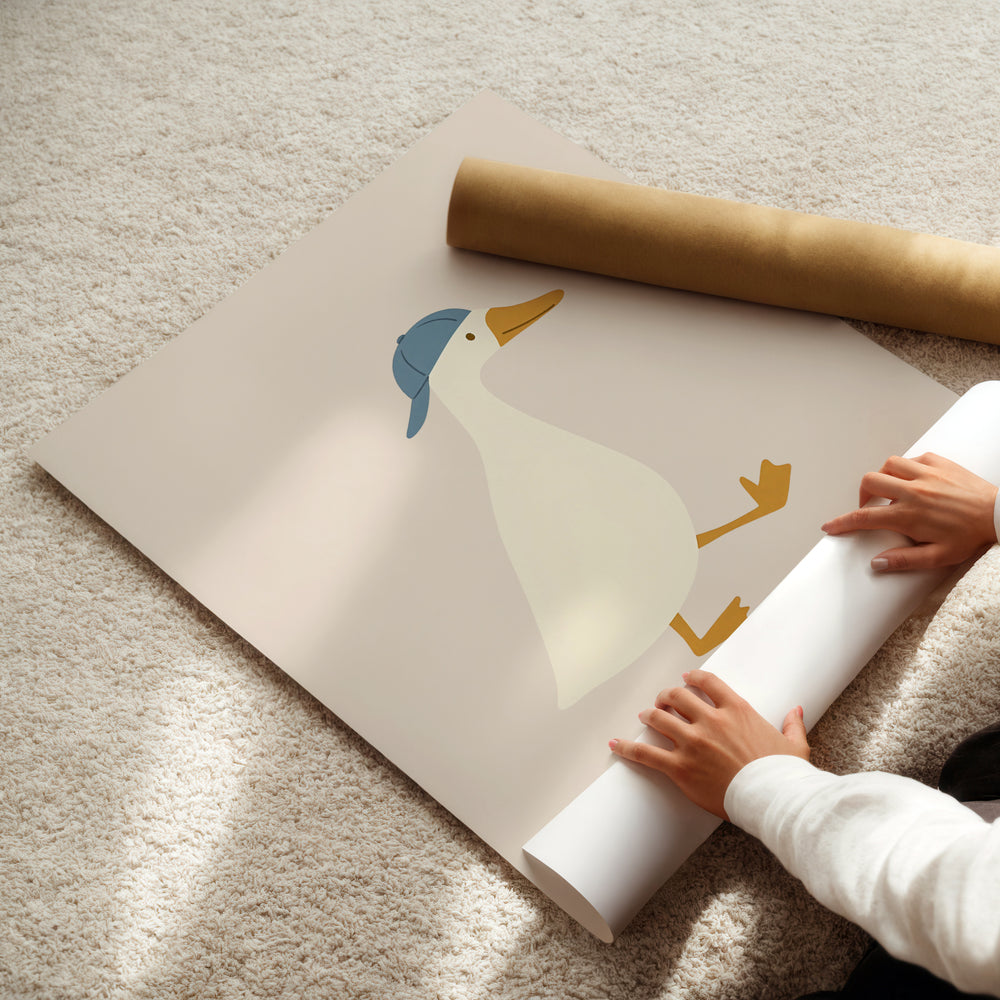 a person is holding a roll of paper with a picture of a duck on it