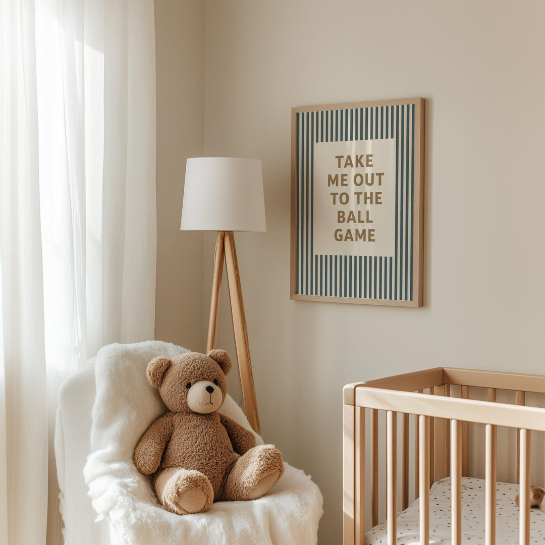 a teddy bear sitting in a chair next to a crib