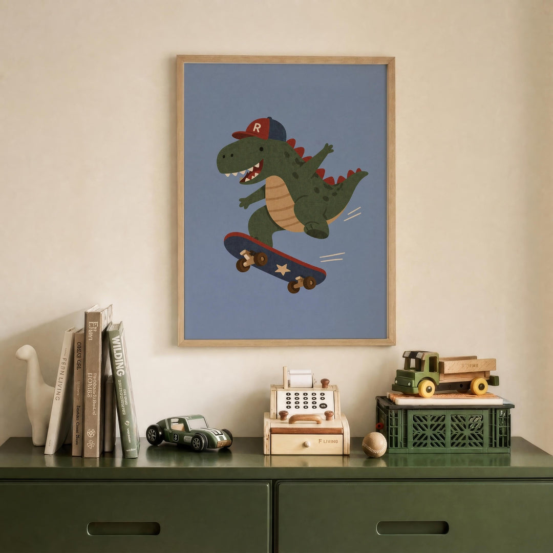 a framed illustration of a dinosaur riding a skateboard, displayed on a wall above a green dresser with various toys and books on it.