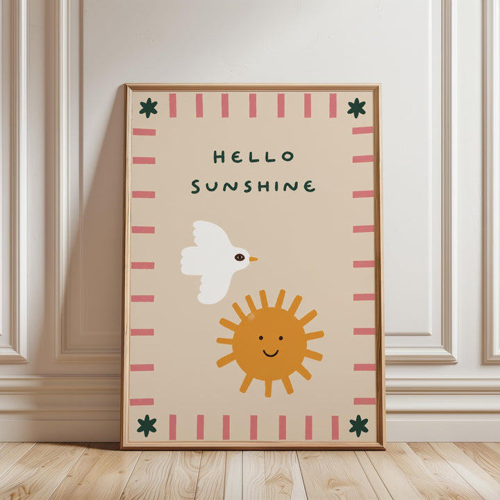 A framed poster with a cheerful design featuring a bird, a sun, and the text "Hello Sunshine".