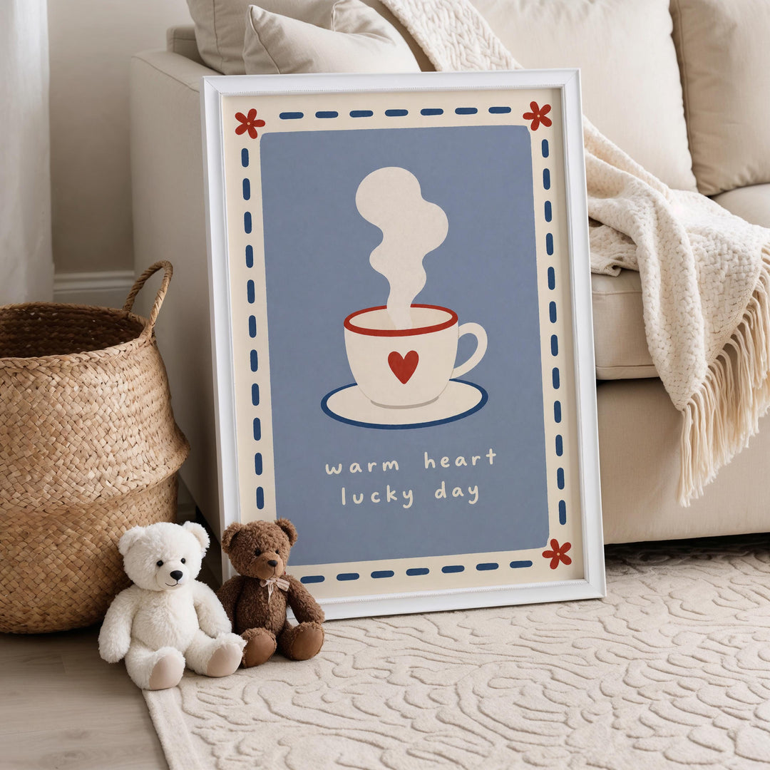 A framed poster with a cup of coffee and a heart on it, placed on a beige rug next to a basket and two stuffed teddy bears.