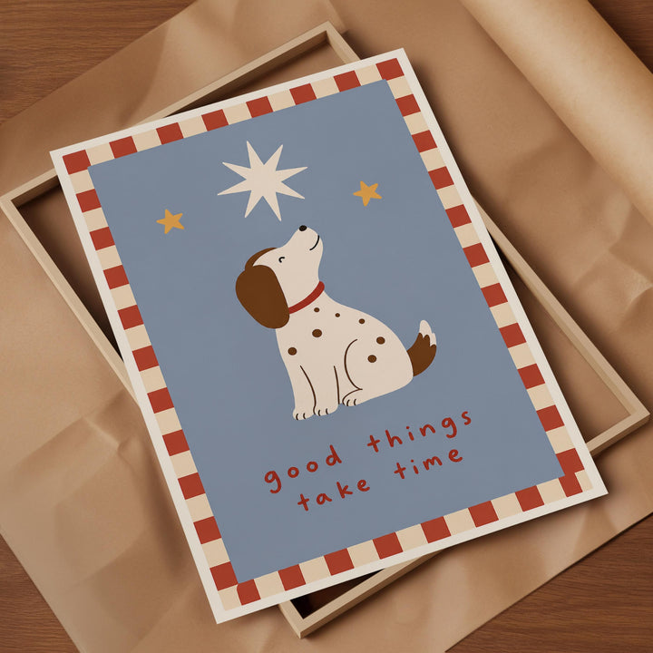 A framed card with a cartoon dog and a starry night sky.