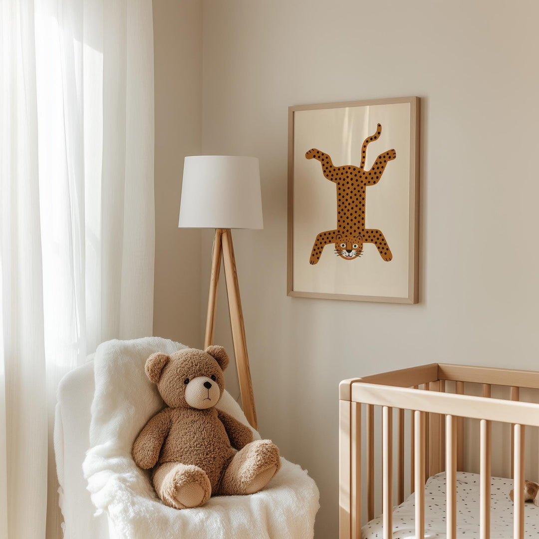 a teddy bear sitting in a chair next to a crib