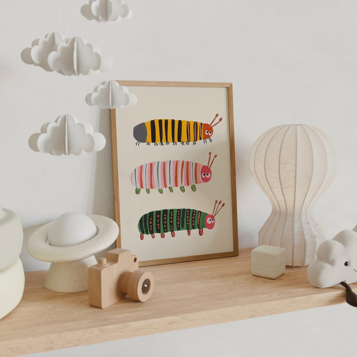 a picture of a picture of a caterpillar on a shelf