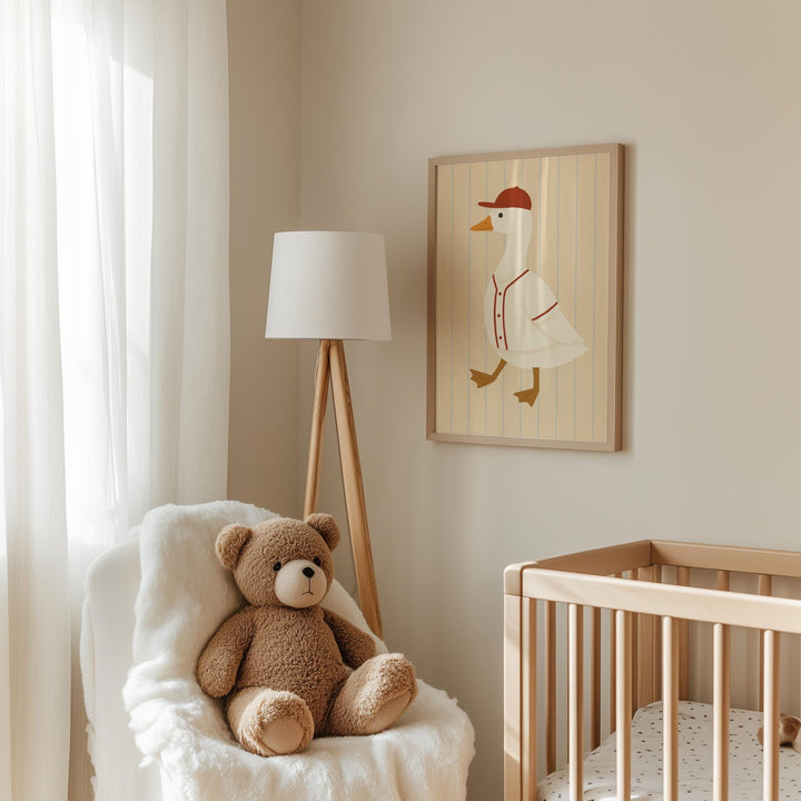 a teddy bear sitting in a chair next to a crib
