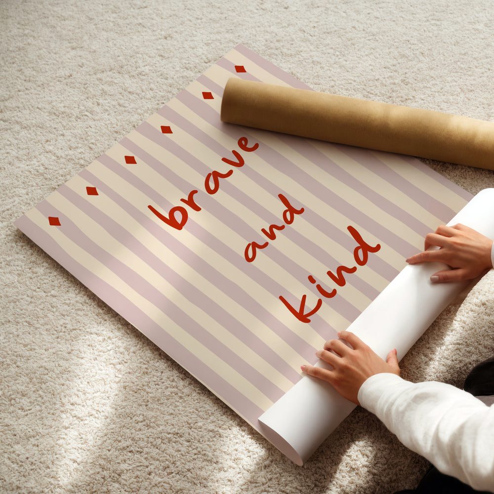 a person holding a roll of paper with a message on it
