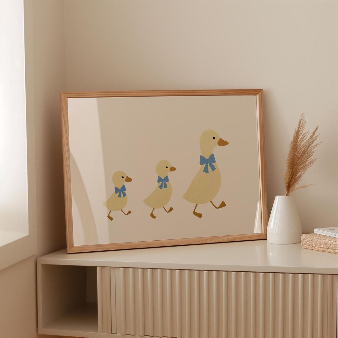a picture of a duck family on a shelf