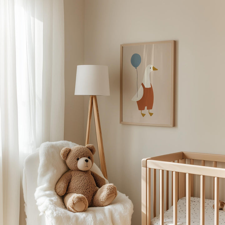 a teddy bear sitting in a chair next to a crib