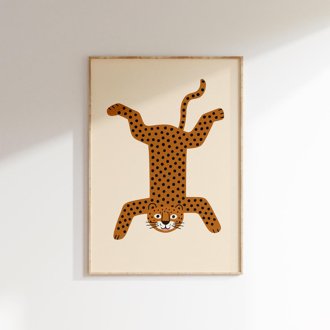 a picture of a cat hanging on a wall