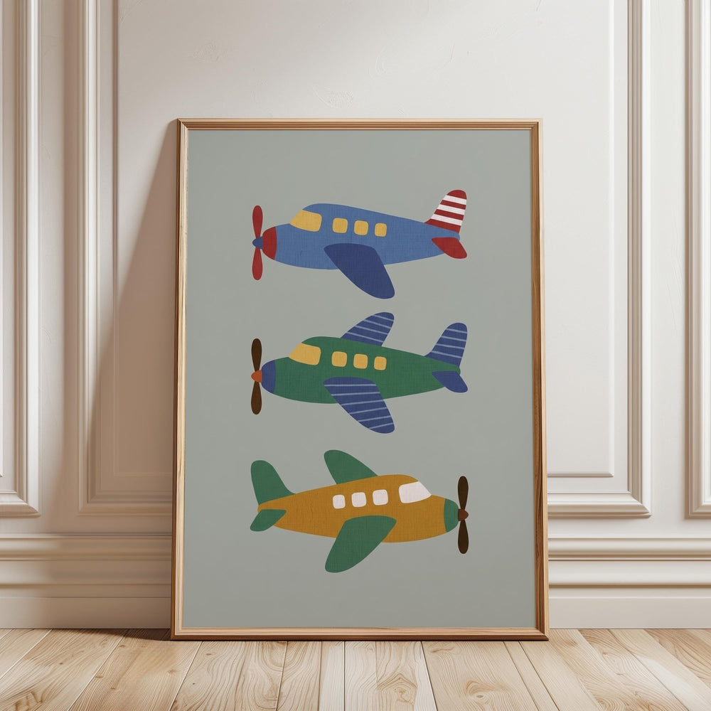 A framed print of three colorful airplanes is displayed on a wall.