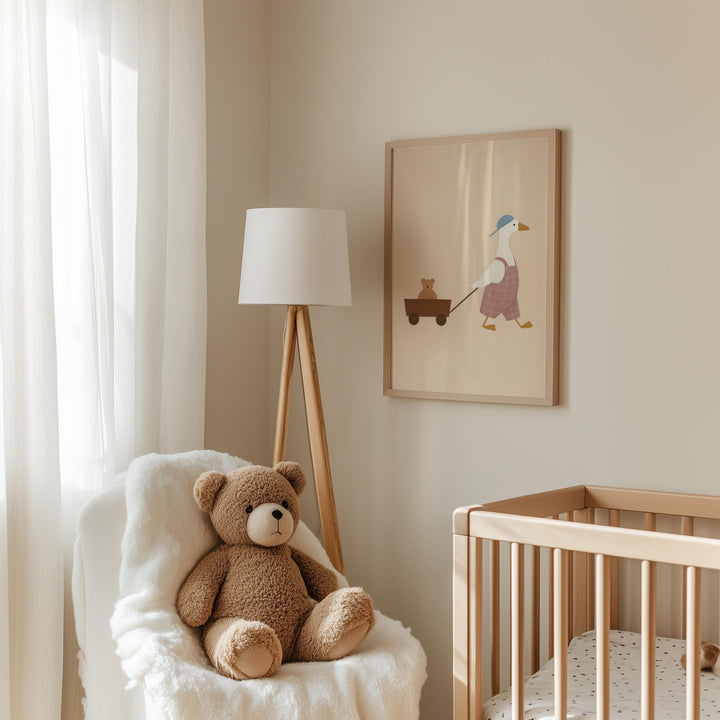 a teddy bear sitting in a chair next to a crib