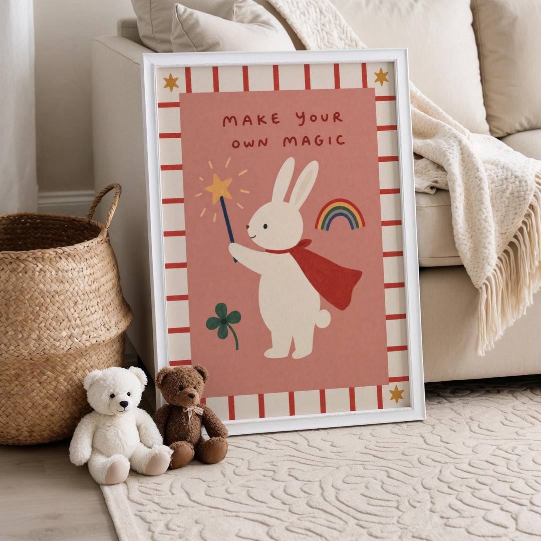 A framed poster with a cartoon rabbit holding a wand and a rainbow, accompanied by two stuffed teddy bears sitting on the floor.