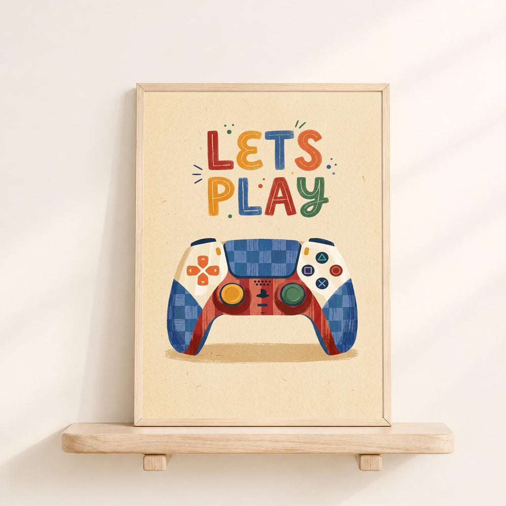 A framed poster with a colorful illustration of a game controller and the text "LET'S PLAY" written on it.