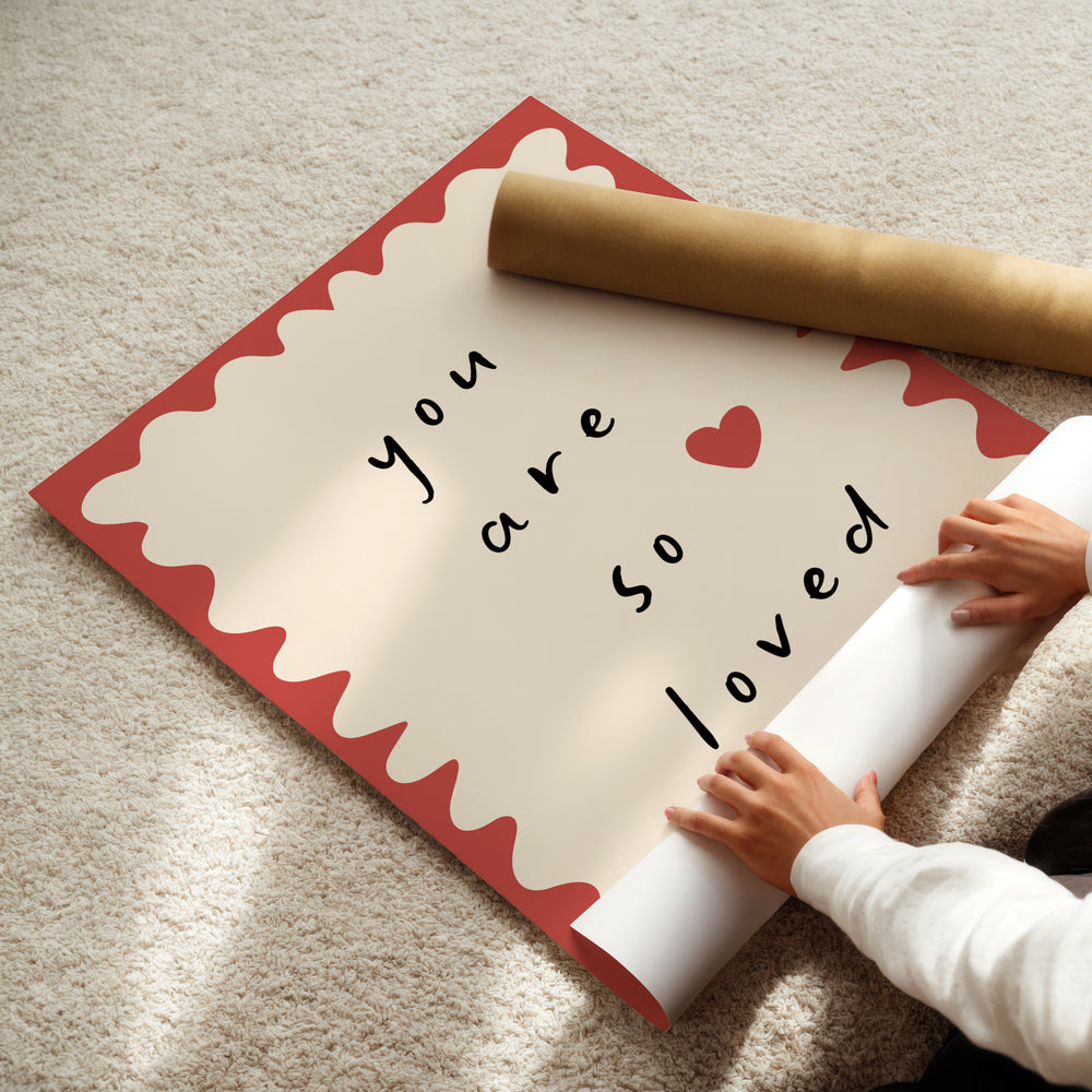 a person holding a rolled up paper with a message on it