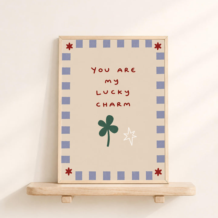 a framed piece of art with a message that reads "You are my lucky charm".