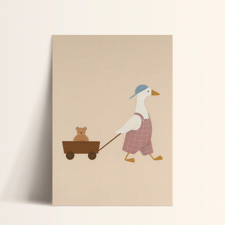 a duck pulling a wagon with a teddy bear