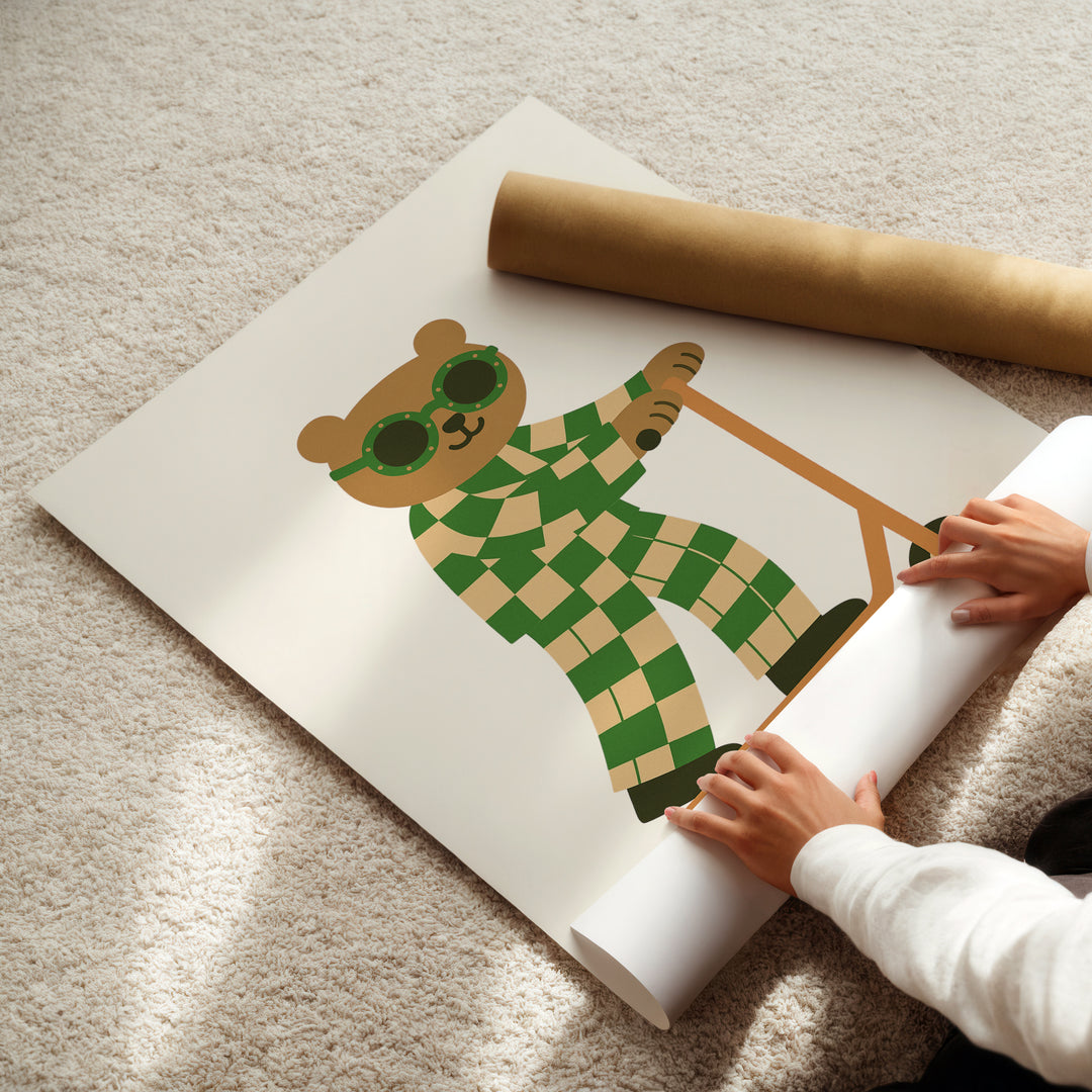 a person holding a roll of paper with a picture of a teddy bear on it