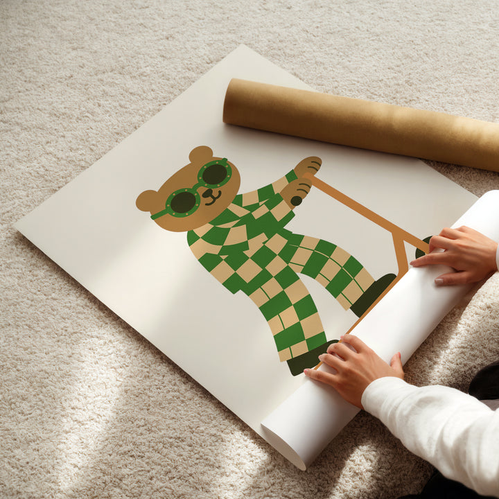a person holding a roll of paper with a picture of a teddy bear on it
