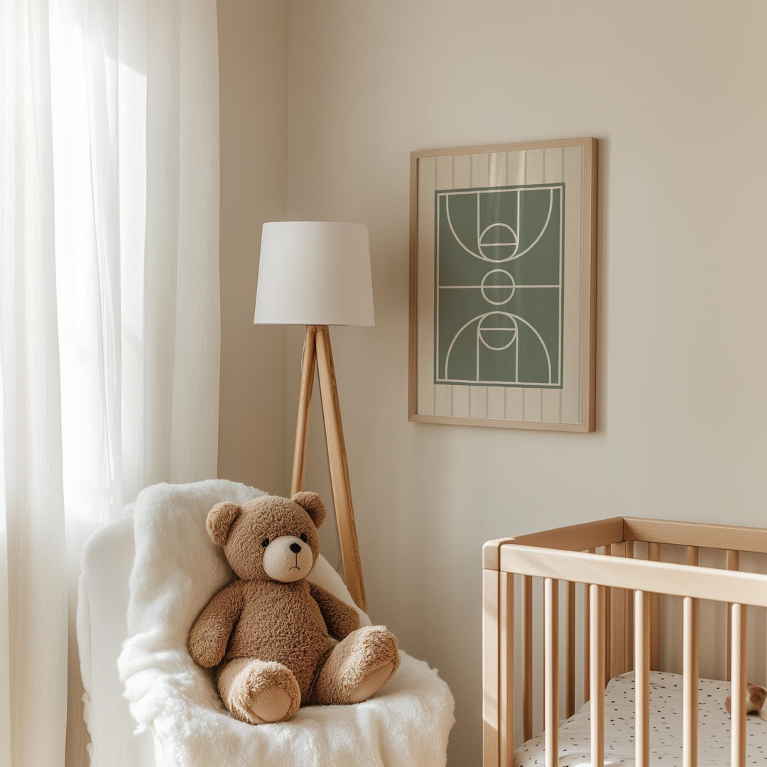 a teddy bear sitting in a chair next to a crib