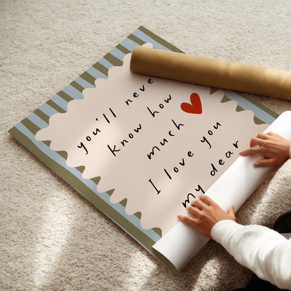 a child is holding a roll of paper with a message on it