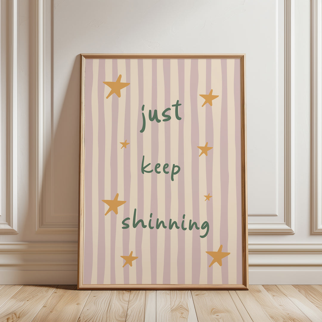 a picture frame sitting on a wooden floor next to a wall
