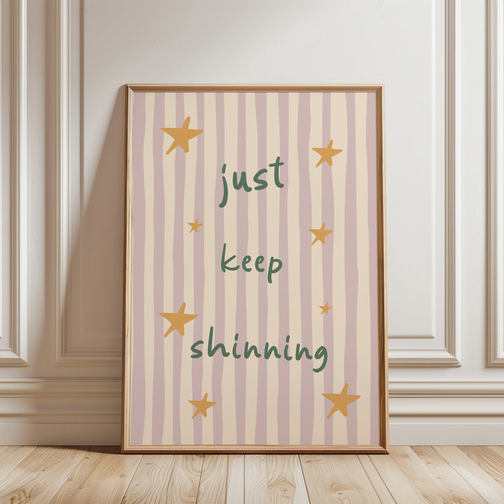 a picture frame sitting on a wooden floor next to a wall