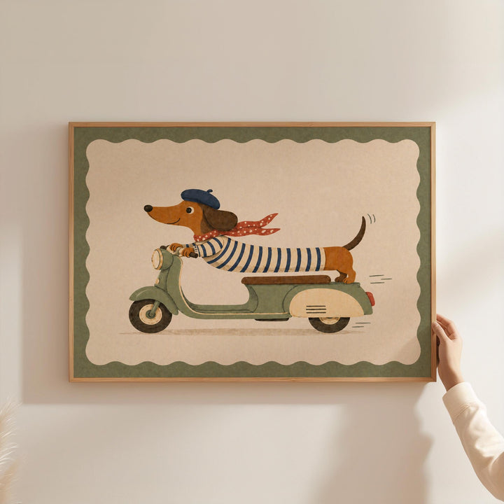 A person is holding up a framed picture of a dog riding a scooter.