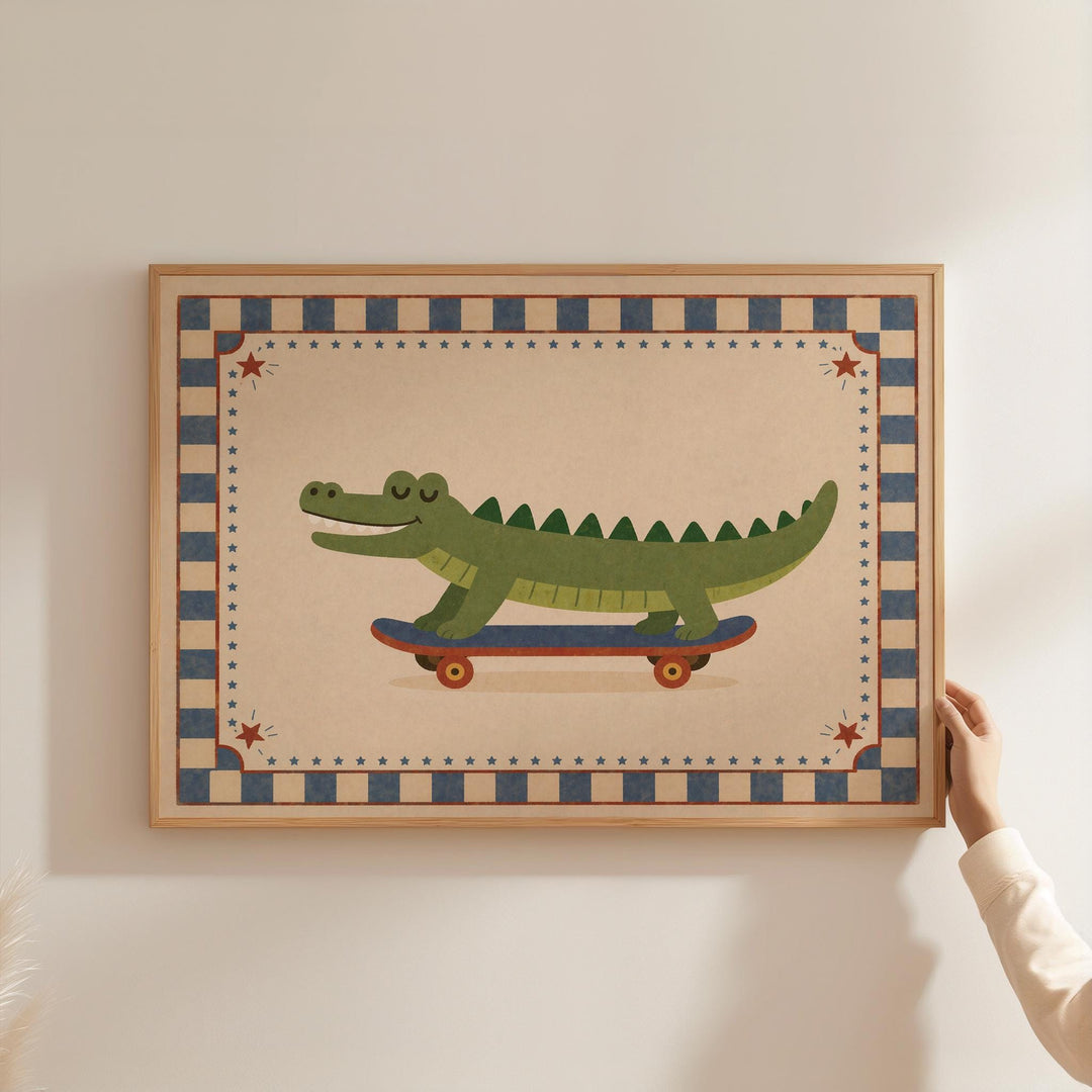 A person is holding a framed picture of a green alligator riding a skateboard.