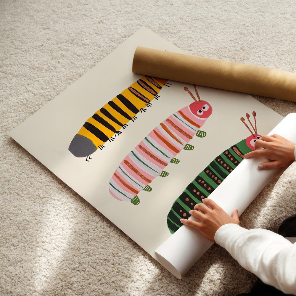 a child is drawing a picture of a caterpillar