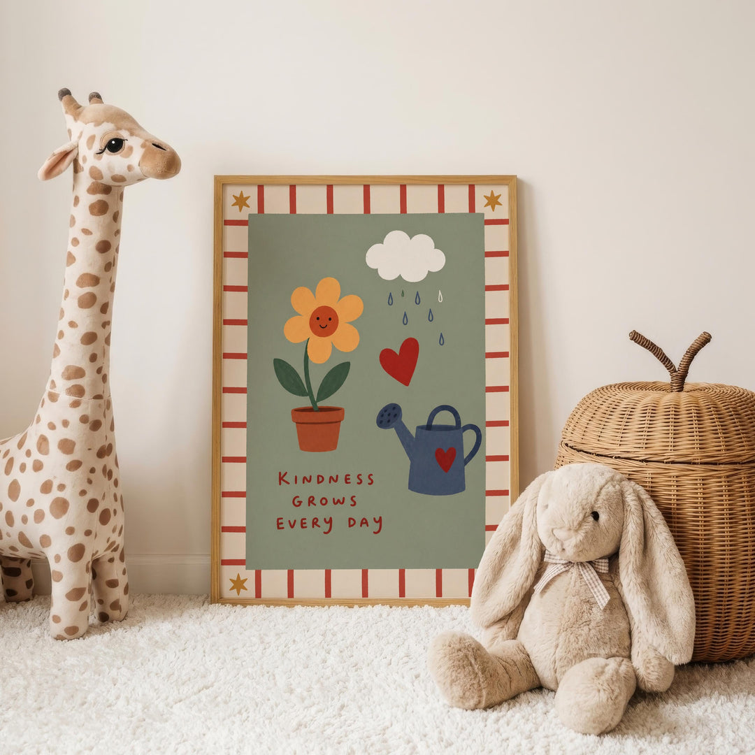 a framed poster with a giraffe, a flower, a watering can, and a rabbit, along with the text "Kindness grows every day". The poster is displayed on a white wall, and there are two stuffed animals, a giraffe and a rabbit, positioned in front of it.