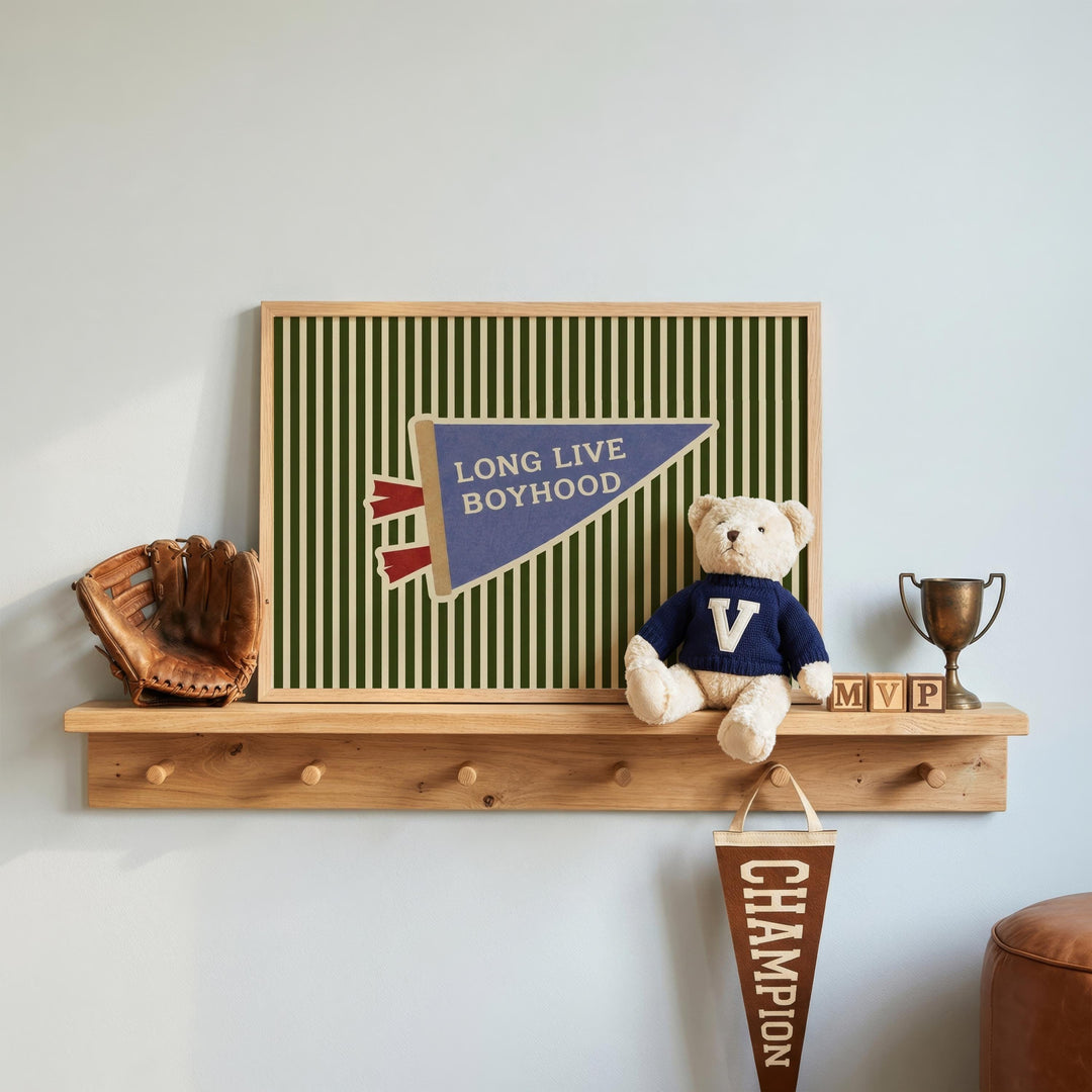 a shelf with various items, including a teddy bear, a baseball glove, a trophy, and a banner with the text "LONG LIVED BOYHOOD".