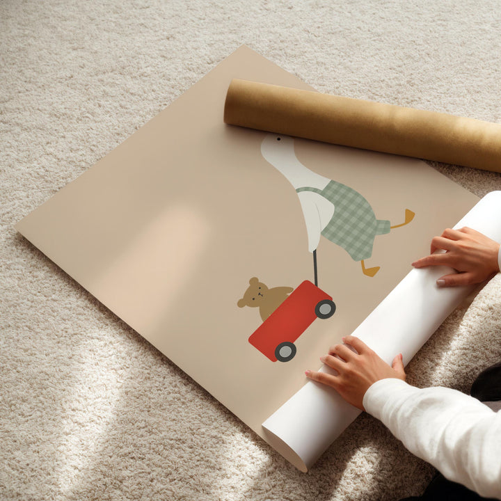 a person holding a roll of paper with a picture of a dog on it