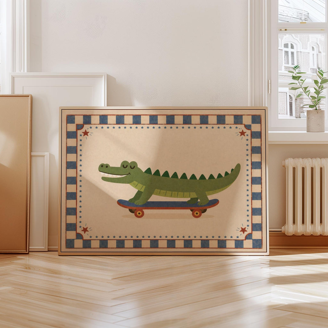 A framed illustration of a green alligator riding a skateboard is displayed on a wooden floor in a room with a window and a radiator.