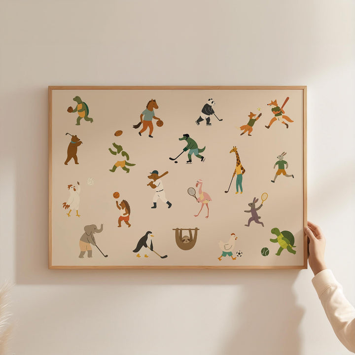 a person holding up a framed picture with a variety of people on it