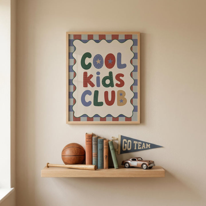 a framed poster with the text "COOL KIDS CLUB" on it, along with a small flag that says "GO TEAM" below it. Below the poster, there is a shelf holding various items, including a basketball, baseball bat, and a toy car.