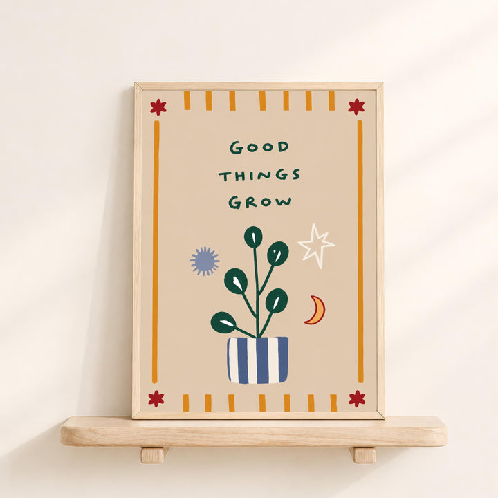 The image is a framed poster with a plant illustration and the text "Good things grow" on it.