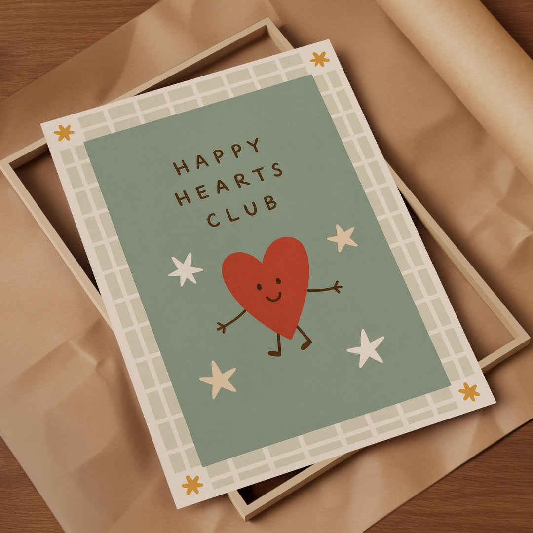 a card with a heart and stars, along with the text "Happy Hearts Club" written on it.