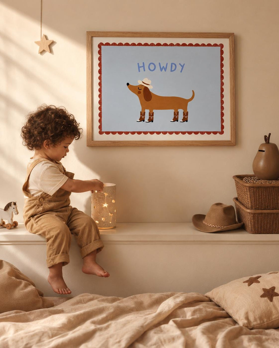A young child is sitting on a shelf, looking at a framed picture of a cartoon dog wearing a cowboy hat.