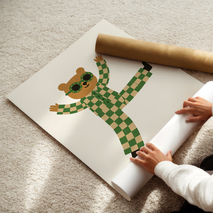 a person holding a roll of paper with a picture of a monkey on it