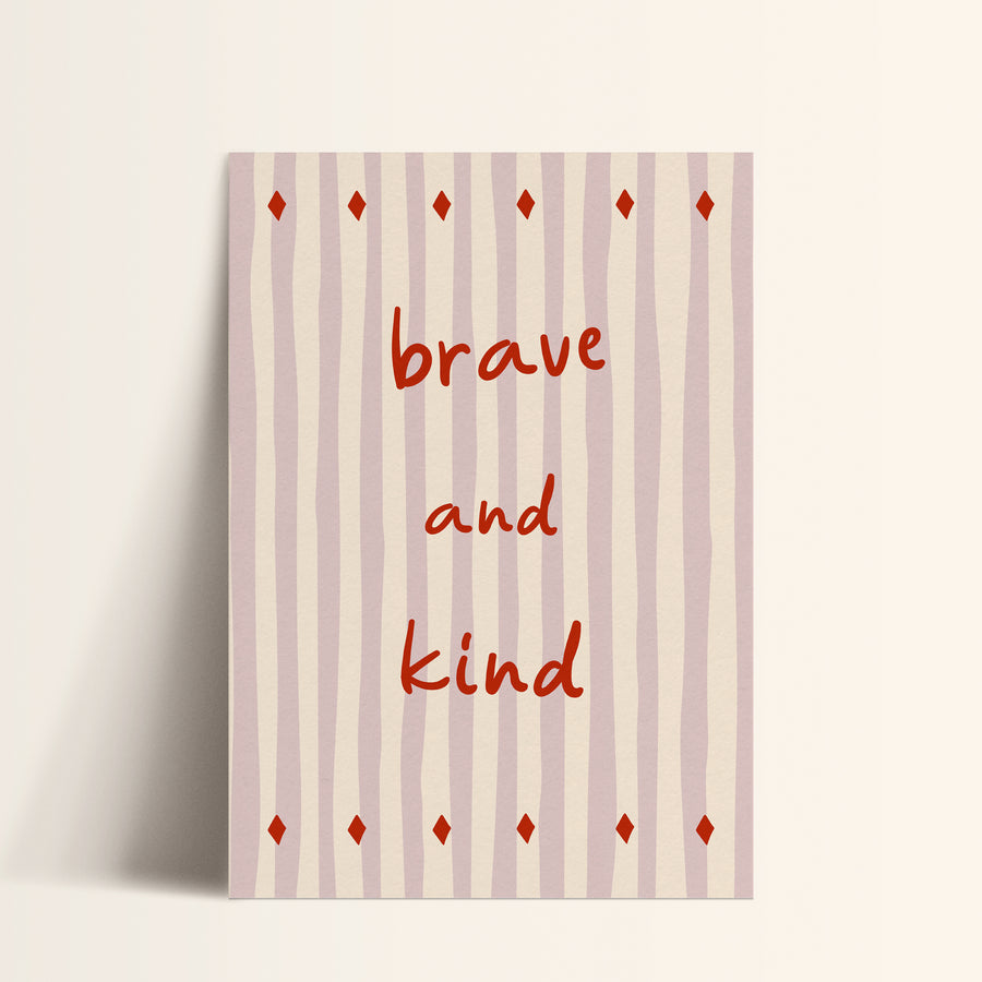 a card with the words brave and kind written on it
