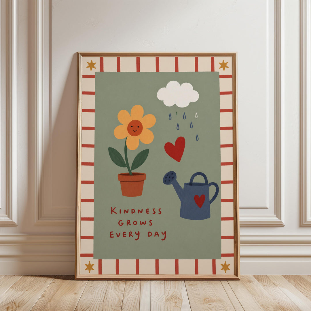 The image is a framed poster with a green background, featuring illustrations of a flower, a watering can, and raindrops. The text on the poster reads "Kindness grows every day".