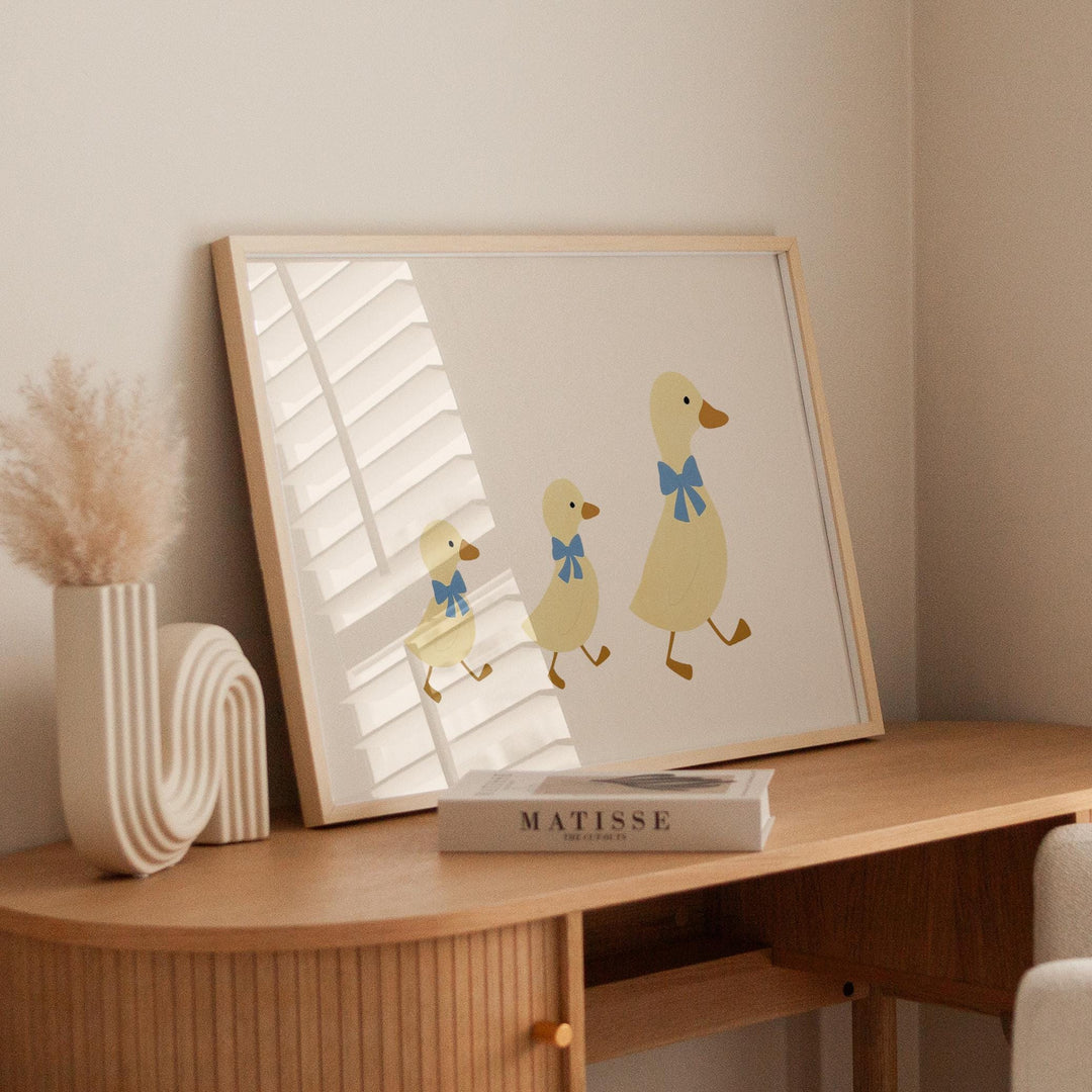 a picture of a duck and a duckling on a table