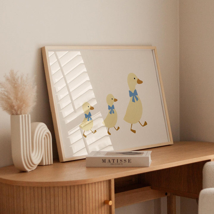 a picture of a duck and a duckling on a table