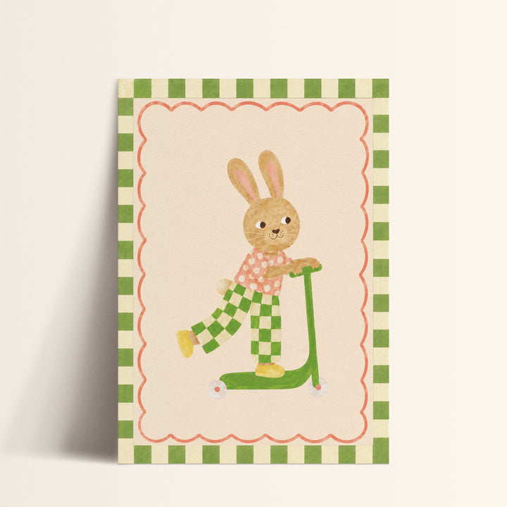 Illustrated print of a bunny in checkered trousers riding a green scooter