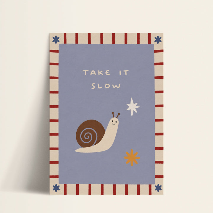 Take It Slow smiling snail print shown as a matte paper art print