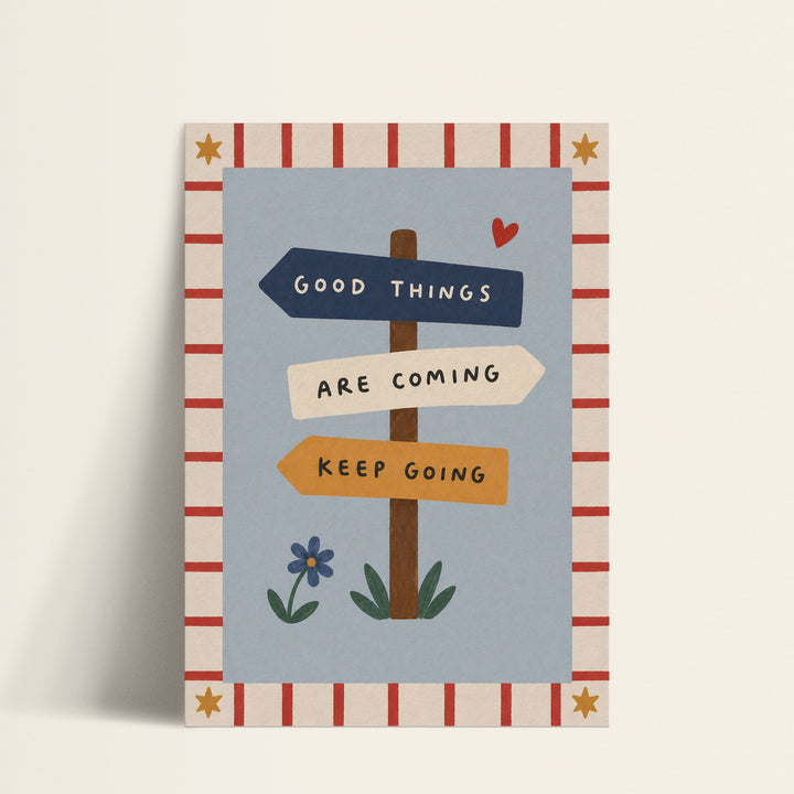 Good Things Are Coming signpost print shown as a matte paper art print
