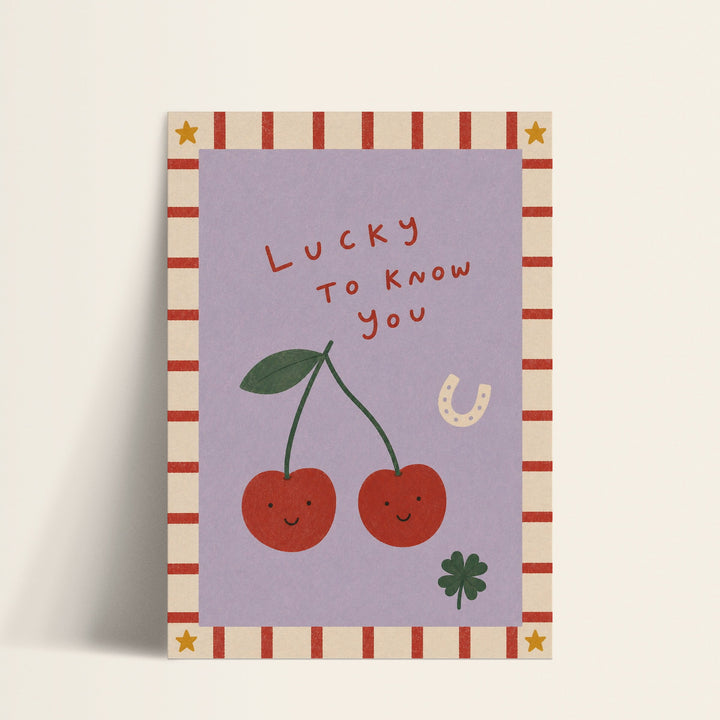 Lucky to Know You smiling cherries print shown as a matte paper art print