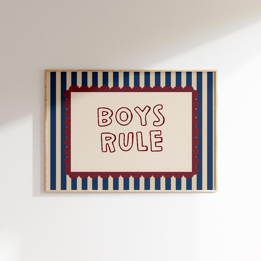 a framed poster with the text "BOYS RULE" written on it.
