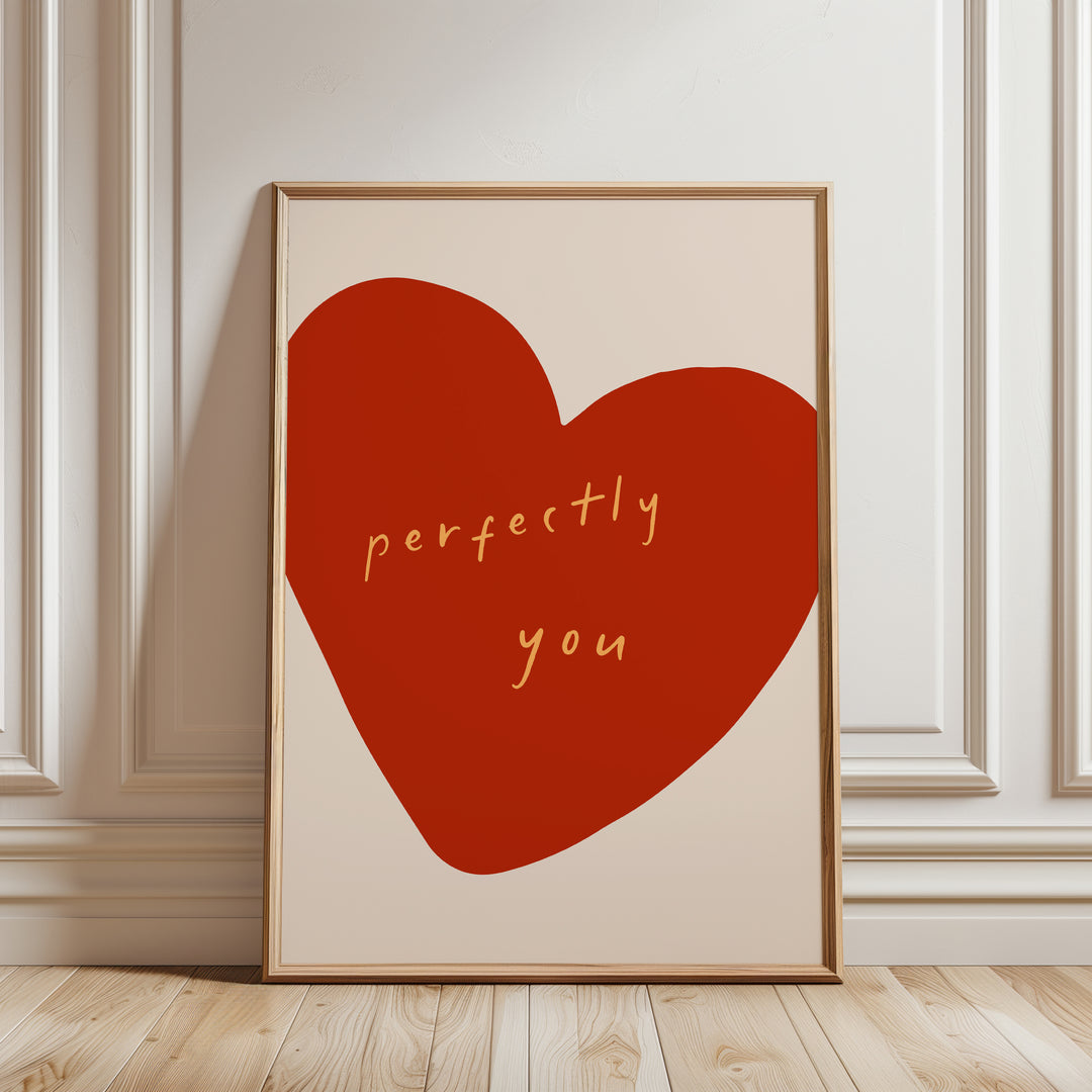 a picture of a red heart with the words perfectly you written on it