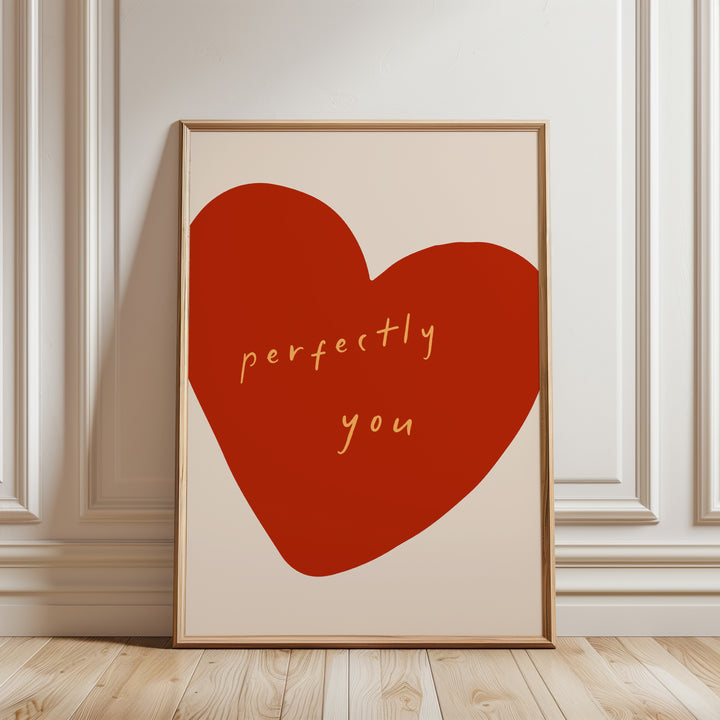 a picture of a red heart with the words perfectly you written on it